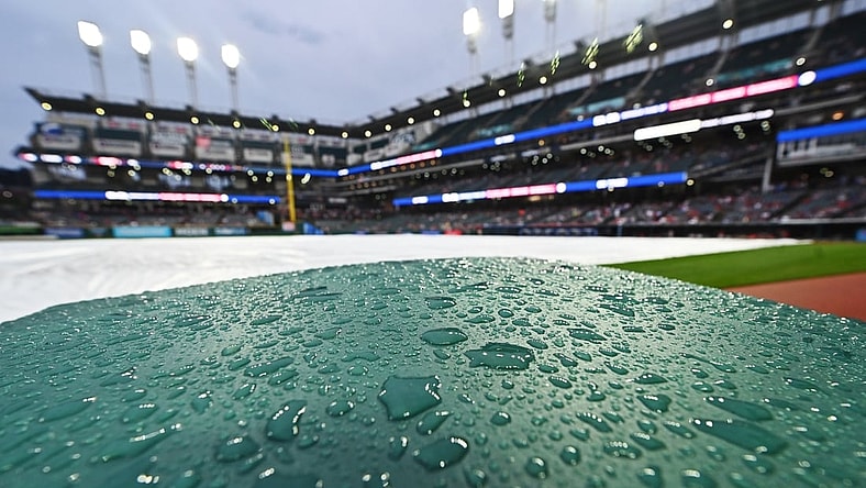 Jun 29, 2021; Cleveland, Ohio, USA; Rain collects on the protective barrier at at Progressive Field as the game between the Cleveland Indians and the Detroit Tigers is delayed. Mandatory Credit: Ken Blaze-USA TODAY Sports