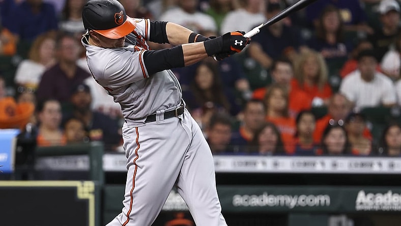 Jun 30, 2021; Houston, Texas, USA; Baltimore Orioles designated hitter Ryan Mountcastle (6) hits an RBI double during the first inning against the Houston Astros at Minute Maid Park. Mandatory Credit: Troy Taormina-USA TODAY Sports