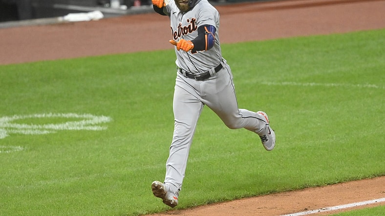 Jun 30, 2021; Cleveland, Ohio, USA; Detroit Tigers catcher Eric Haase (13) celebrates his solo home run during the fourth inning against the Cleveland Indians at Progressive Field. Mandatory Credit: David Richard-USA TODAY Sports