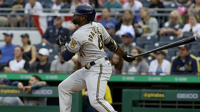 Jul 1, 2021; Pittsburgh, Pennsylvania, USA; Milwaukee Brewers center fielder Jackie Bradley Jr. (41) hits an RBI double against the Pittsburgh Pirates during the second inning at PNC Park. Mandatory Credit: Charles LeClaire-USA TODAY Sports