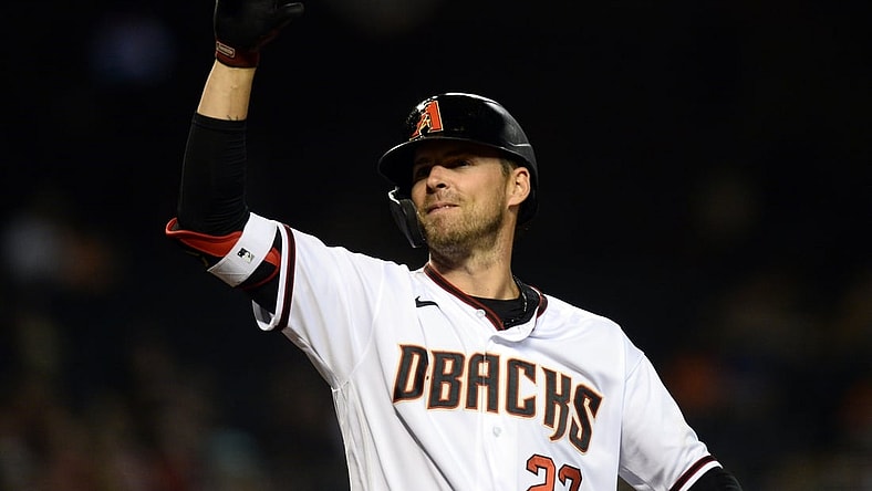 Jul 1, 2021; Phoenix, Arizona, USA; Arizona Diamondbacks right fielder Josh Reddick (22) reacts after hitting a two run home run against the San Francisco Giants during the fourth inning at Chase Field. Mandatory Credit: Joe Camporeale-USA TODAY Sports