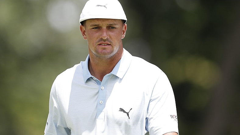 Jul 2, 2021; Detroit, Michigan, USA; Bryson DeChambeau walks on the 9th green during the second round of the Rocket Mortgage Classic golf tournament. Mandatory Credit: Raj Mehta-USA TODAY Sports