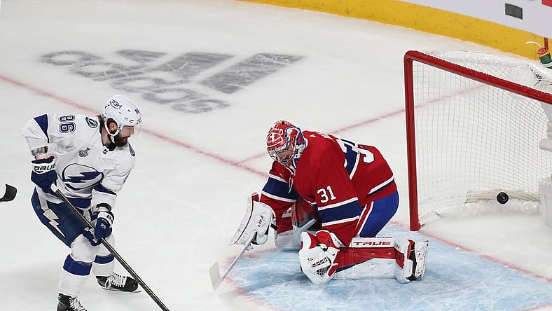 Jul 2, 2021; Montreal, Quebec, CAN; Montreal Canadiens goaltender Carey Price (31) defends the net against Tampa Bay Lightning right wing Nikita Kucherov (86) during the first period in game three of the 2021 Stanley Cup Final at Bell Centre. Mandatory Credit: Jean-Yves Ahern-USA TODAY Sports