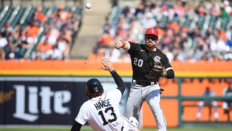 Jul 3, 2021; Detroit, Michigan, USA; Chicago White Sox second baseman Danny Mendick (20) forces Detroit Tigers left fielder Eric Haase (13) out at second base during the second inning at Comerica Park. Mandatory Credit: Tim Fuller-USA TODAY Sports