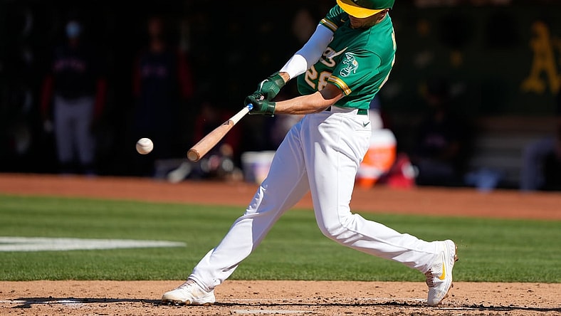 Jul 3, 2021; Oakland, California, USA; Oakland Athletics first baseman Matt Olson (28) hits a single during the third inning against the Boston Red Sox at RingCentral Coliseum. Mandatory Credit: Stan Szeto-USA TODAY Sports