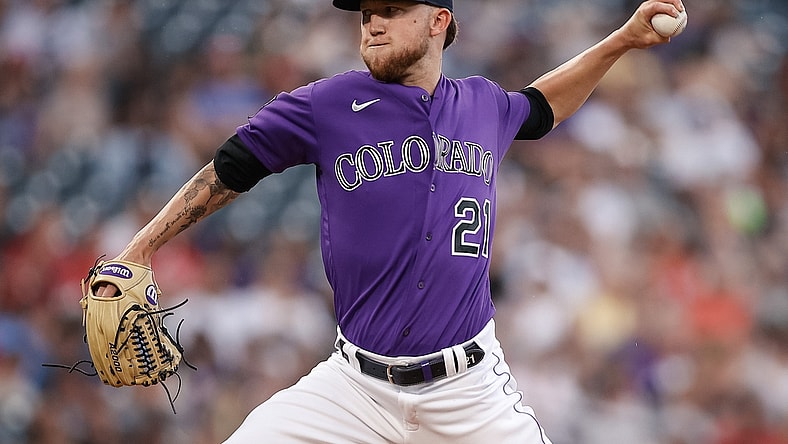 Jul 3, 2021; Denver, Colorado, USA; Colorado Rockies starting pitcher Kyle Freeland (21) throws a pitch in the first inning against the St. Louis Cardinals at Coors Field. Mandatory Credit: Isaiah J. Downing-USA TODAY Sports