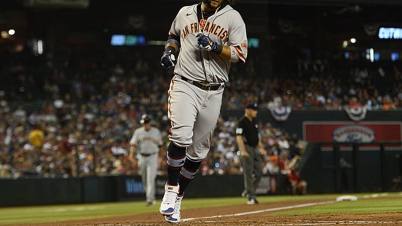 Jul 3, 2021; Phoenix, Arizona, USA; San Francisco Giants shortstop Brandon Crawford (35) scores a run against the Arizona Diamondbacks during the third inning at Chase Field. Mandatory Credit: Joe Camporeale-USA TODAY Sports