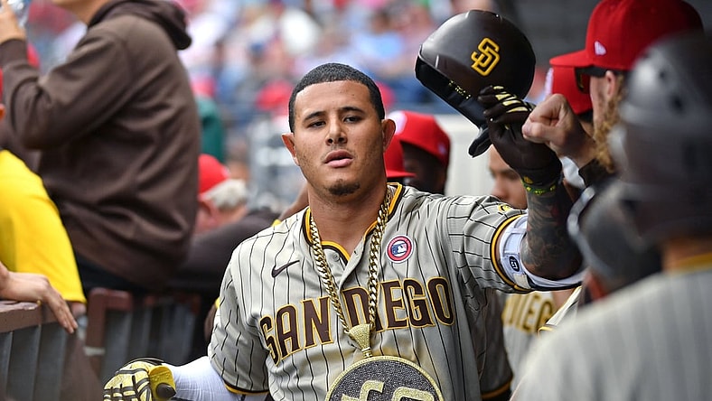 Jul 4, 2021; Philadelphia, Pennsylvania, USA; San Diego Padres third baseman Manny Machado (13) celebrates with teammates after hitting a two run home run against the Philadelphia Phillies during the first inning at Citizens Bank Park. Mandatory Credit: Eric Hartline-USA TODAY Sports