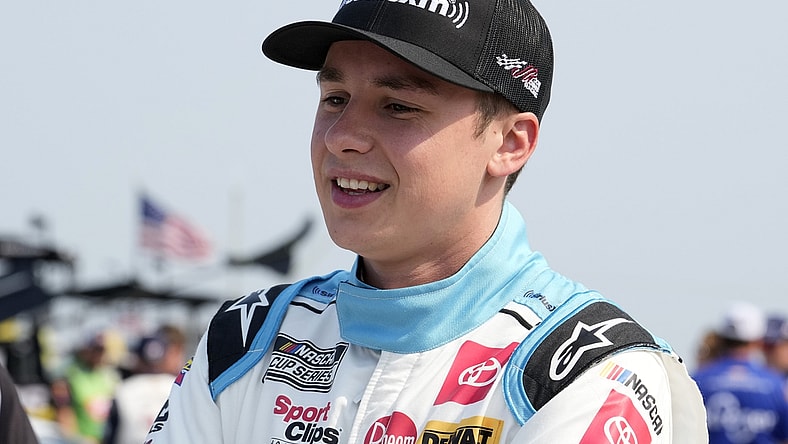Jul 4, 2021; Elkhart Lake, Wisconsin, USA; NASCAR Cup Series driver Christopher Bell (20) before the Jockey Made in America 250 Presented by Kwik Trip at Road America. Mandatory Credit: Mike Dinovo-USA TODAY Sports