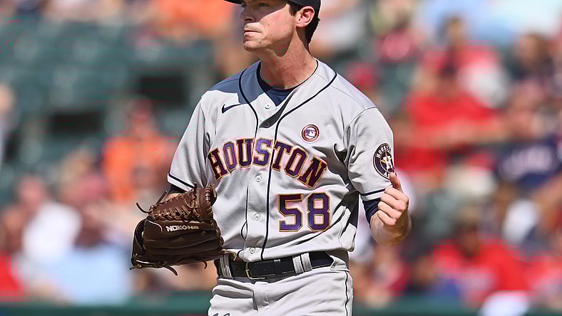 Jul 4, 2021; Cleveland, Ohio, USA; Houston Astros relief pitcher Brooks Raley (58) celebrates after striking out Cleveland Indians pinch hitter Oscar Mercado (not pictured) to end the game at Progressive Field. Mandatory Credit: Ken Blaze-USA TODAY Sports