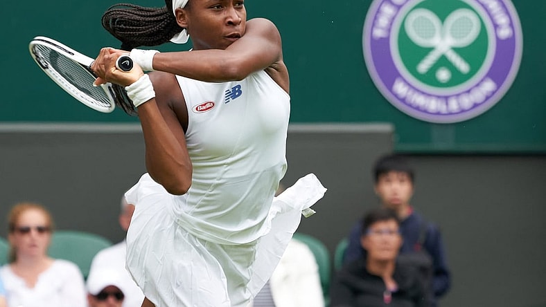 Jul 5, 2021; London, United Kingdom;  Coco Gauff (USA) seen playing Angelique Kerber (GER) on the Centre court in the ladies fourth round at All England Lawn Tennis and Croquet Club. Mandatory Credit: Peter van den Berg-USA TODAY Sports