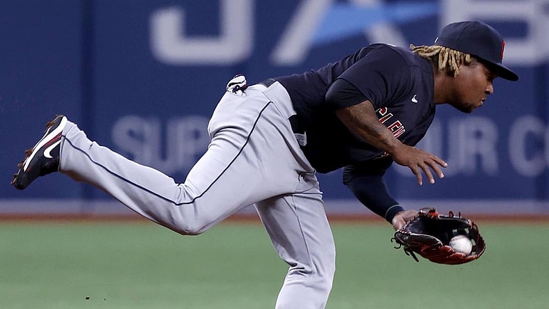 Jul 5, 2021; St. Petersburg, Florida, USA;  Cleveland Indians third baseman Jose Ramirez (11) throws the ball for an out during the first inning against the Tampa Bay Rays at Tropicana Field. Mandatory Credit: Kim Klement-USA TODAY Sports