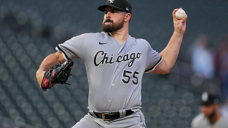 Jul 6, 2021; Minneapolis, Minnesota, USA; Chicago White Sox starting pitcher Carlos Rodon (55) pitches against the Minnesota Twins in the first inning at Target Field. Mandatory Credit: Brad Rempel-USA TODAY Sports