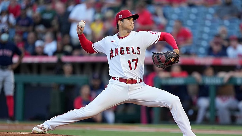 Jul 6, 2021; Anaheim, California, USA; Los Angeles Angels starting pitcher Shohei Ohtani (17) delivers a pitch in the first inning at bat  at Angel Stadium. Mandatory Credit: Kirby Lee-USA TODAY Sports