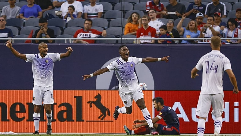 Jul 7, 2021; Chicago, Illinois, USA; Orlando City midfielder Andres Perea (21) celebrates after scoring against the Chicago Fire during the first half at Soldier Field. Mandatory Credit: Kamil Krzaczynski-USA TODAY Sports
