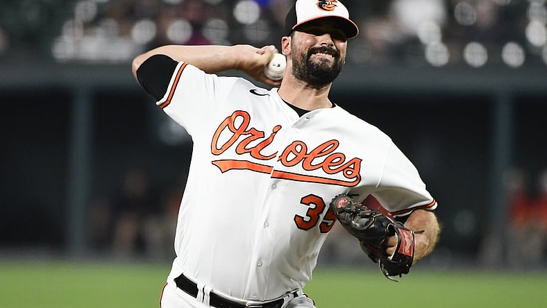 Jul 7, 2021; Baltimore, Maryland, USA; Baltimore Orioles relief pitcher Adam Plutko (35) delivers pitch against the Toronto Blue Jays  at Oriole Park at Camden Yards. Mandatory Credit: Tommy Gilligan-USA TODAY Sports