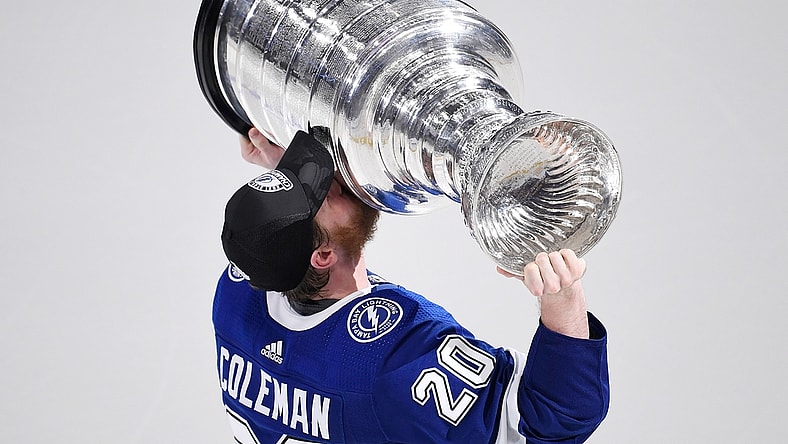 Jul 7, 2021; Tampa, Florida, USA; Tampa Bay Lightning center Blake Coleman (20) kisses the Stanley Cup after the Lightning defeated the Montreal Canadiens 1-0 in game five to win the 2021 Stanley Cup Final at Amalie Arena. Mandatory Credit: Douglas DeFelice-USA TODAY Sports