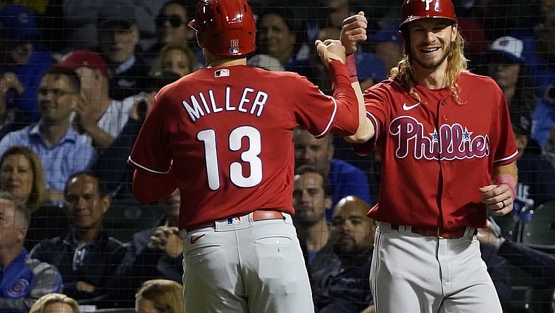 Jul 8, 2021; Chicago, Illinois, USA; Philadelphia Phillies first baseman Brad Miller (13) is greeted by center fielder Travis Jankowski (9) after hitting a two run home run against the Chicago Cubs during the fifth inning at Wrigley Field. Mandatory Credit: David Banks-USA TODAY Sports