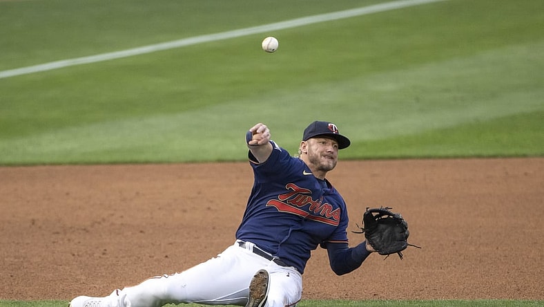 Jul 8, 2021; Minneapolis, Minnesota, USA; Minnesota Twins third baseman Josh Donaldson (20) throws the ball to first base for an out in the fifth inning against the Detroit Tigers at Target Field. Mandatory Credit: Jesse Johnson-USA TODAY Sports