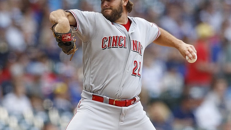 Jul 9, 2021; Milwaukee, Wisconsin, USA;  Cincinnati Reds pitcher Wade Miley (22) throws a pitch during the first inning against the Cincinnati Reds at American Family Field. Mandatory Credit: Jeff Hanisch-USA TODAY Sports