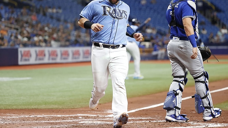 Jul 9, 2021; St. Petersburg, Florida, USA; Tampa Bay Rays catcher Mike Zunino (10) reacts after scoring a run during the third inning against the Toronto Blue Jays at Tropicana Field. Mandatory Credit: Kim Klement-USA TODAY Sports
