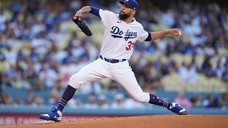 Jul 9, 2021; Los Angeles, California, USA; Los Angeles Dodgers starting pitcher David Price (33) delivers a pitch in the first inning against the Arizona Diamondbacks  at Dodger Stadium. Mandatory Credit: Kirby Lee-USA TODAY Sports