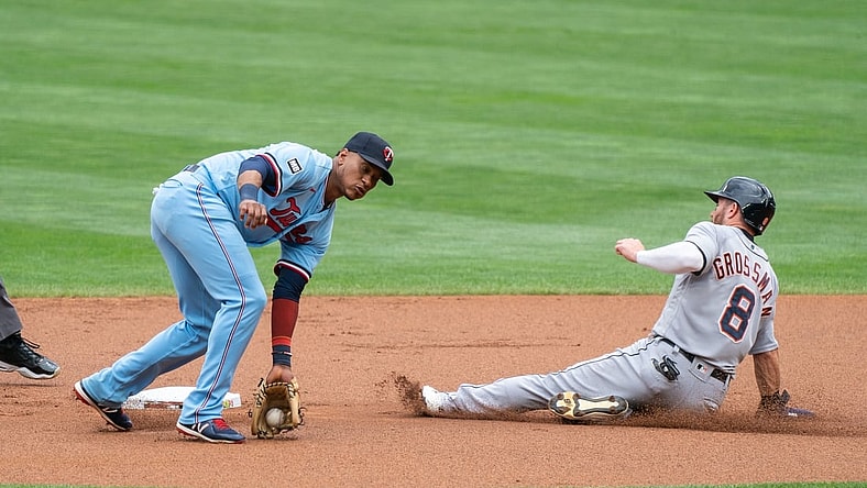 Jul 10, 2021; Minneapolis, Minnesota, USA; Detroit Tigers right fielder Robbie Grossman (8) steals second base during the first inning against the Minnesota Twins at Target Field. Mandatory Credit: Jordan Johnson-USA TODAY Sports
