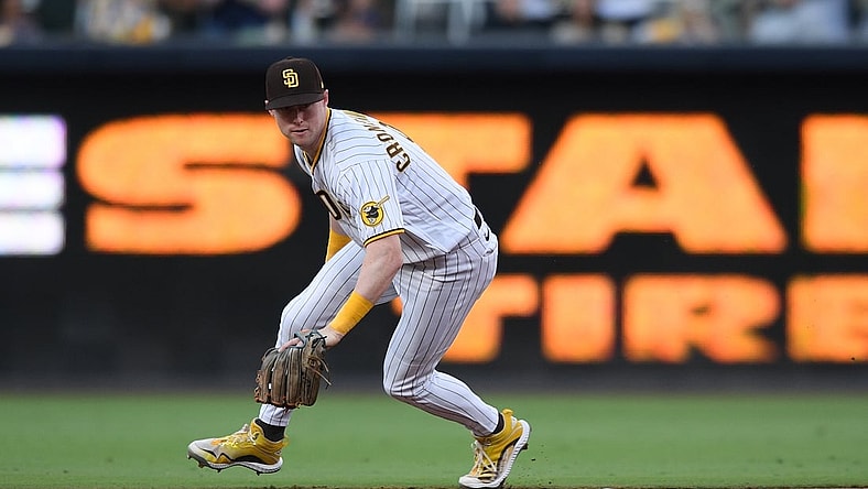 Jul 10, 2021; San Diego, California, USA; San Diego Padres second baseman Jake Cronenworth (9) fields a ground ball hit for a single by Colorado Rockies left fielder Raimel Tapia (not pictured) during the first inning at Petco Park. Mandatory Credit: Orlando Ramirez-USA TODAY Sports