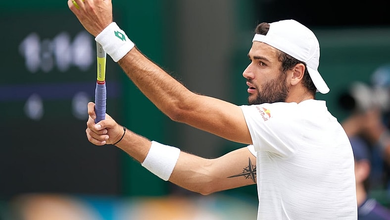 Jul 11, 2021; London, United Kingdom; Matteo Berrettini (ITA) plays against Novak Djokovic (SRB) in the men s final on Centre Court at All England Lawn Tennis and Croquet Club. Mandatory Credit: Peter van den Berg-USA TODAY Sports