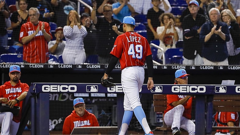 Jul 11, 2021; Miami, Florida, USA; Miami Marlins starting pitcher Pablo Lopez (49) returns to the dugout after the third inning of the game against the Atlanta Braves at loanDepot Park. Mandatory Credit: Sam Navarro-USA TODAY Sports