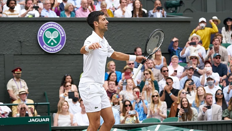 Jul 11, 2021; London, United Kingdom; Novak Djokovic (SRB) celebrates winning the mens final against Matteo Berrettini (ITA) on Centre Court at All England Lawn Tennis and Croquet Club. Mandatory Credit: Peter van den Berg-USA TODAY Sports