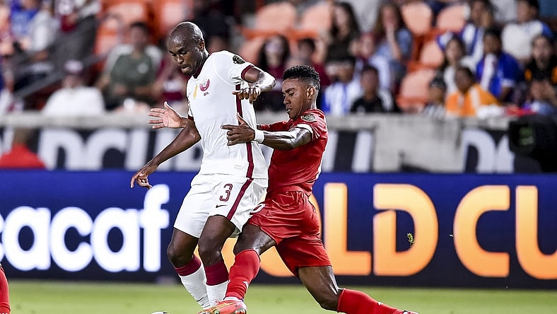 Jul 13, 2021; Houston, Texas, USA; Qatar defender Abdelkarim Hassan (3) and Panama midfielder Edgar Barcenas (10) battle for the ball during the CONCACAF Gold Cup Soccer group stage play at BBVA Stadium. Mandatory Credit: Maria Lysaker-USA TODAY Sports