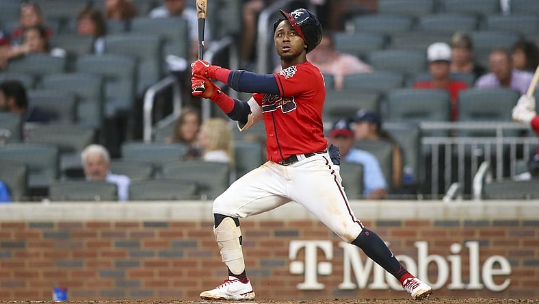 Jul 16, 2021; Atlanta, Georgia, USA; Atlanta Braves second baseman Ozzie Albies (1) has his helmet come off on a swing against the Tampa Bay Rays in the fourth inning at Truist Park. Mandatory Credit: Brett Davis-USA TODAY Sports