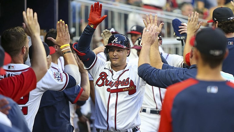 Jul 17, 2021; Atlanta, Georgia, USA; Atlanta Braves right fielder Joc Pederson (22) celebrates with teammates after hitting a two-run home run against the Tampa Bay Rays in the fourth inning at Truist Park. Mandatory Credit: Brett Davis-USA TODAY Sports