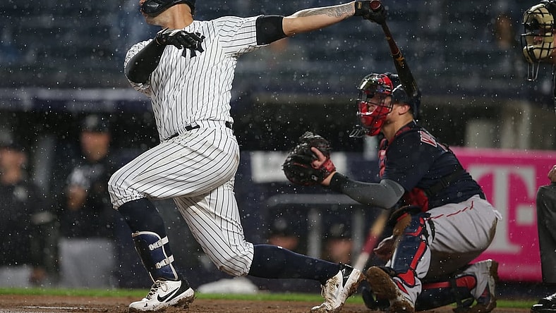 Jul 17, 2021; Bronx, New York, USA; New York Yankees catcher Gary Sanchez (24) follows through on a solo home run against the Boston Red Sox during the sixth inning at Yankee Stadium. Mandatory Credit: Brad Penner-USA TODAY Sports