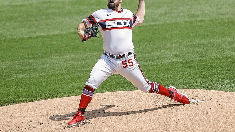 Jul 18, 2021; Chicago, Illinois, USA; Chicago White Sox starting pitcher Carlos Rodon (55) throws a pitch against the Houston Astros during the first inning at Guaranteed Rate Field. Mandatory Credit: Kamil Krzaczynski-USA TODAY Sports