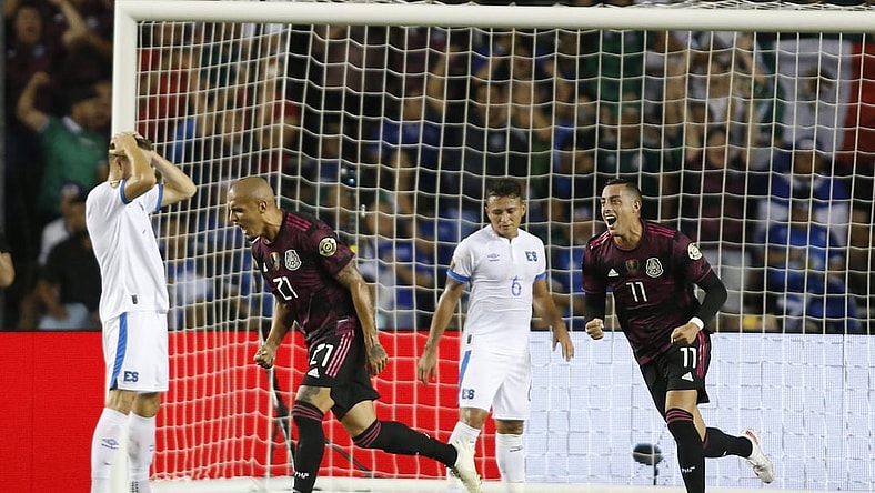 Jul 18, 2021; Dallas, Texas, USA; Mexico defender Luis Rodriguez (21) and forward Rogelio Funes Mori (11) celebrate a goal during the first half against the El Salvador during CONCACAF Gold Cup Soccer group stage play at Cotton Bowl. Mandatory Credit: Tim Heitman-USA TODAY Sports
