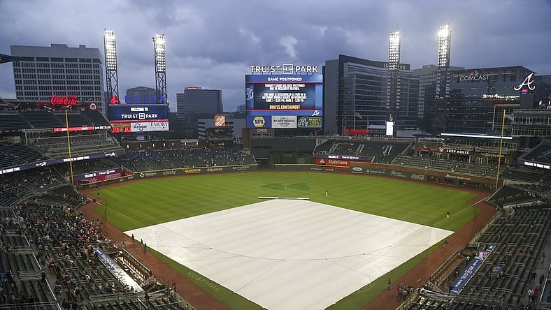 Jul 19, 2021; Atlanta, Georgia, USA; General view of the tarp on the field at Truist Park after a game was canceled between the Atlanta Braves and San Diego Padres due to rain. Mandatory Credit: Brett Davis-USA TODAY Sports
