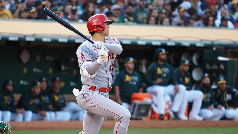 Jul 19, 2021; Oakland, California, USA; Los Angeles Angels designated hitter Shohei Ohtani (17) hits a double against the Oakland Athletics during the third inning at RingCentral Coliseum. Mandatory Credit: Kelley L Cox-USA TODAY Sports