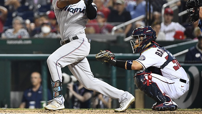 Jul 20, 2021; Washington, District of Columbia, USA; Miami Marlins center fielder Starling Marte (6) hits a single against the Washington Nationals during the sixth inning at Nationals Park. Mandatory Credit: Brad Mills-USA TODAY Sports
