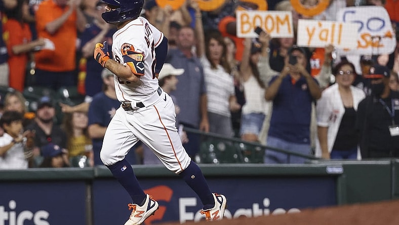 Jul 20, 2021; Houston, Texas, USA; Houston Astros second baseman Jose Altuve (27) rounds the bases after hitting a home run during the third inning against the Cleveland Indians at Minute Maid Park. Mandatory Credit: Troy Taormina-USA TODAY Sports