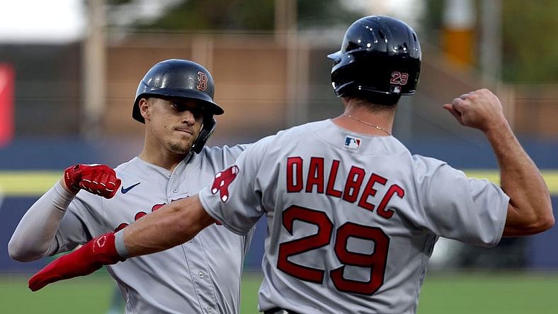 Jul 21, 2021; Buffalo, New York, USA;  Boston Red Sox center fielder Enrique Hernandez (5) celebrates his two run home run with first baseman Bobby Dalbec (29) during the third inning against Toronto Blue Jays at Sahlen Field. Mandatory Credit: Timothy T. Ludwig-USA TODAY Sports