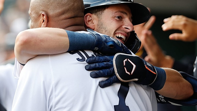 Jul 21, 2021; Detroit, Michigan, USA; Detroit Tigers shortstop Zack Short (59) receives congratulations from first baseman Jonathan Schoop (7) after he hit a two run home run in the second inning against the Texas Rangers at Comerica Park. Mandatory Credit: Rick Osentoski-USA TODAY Sports