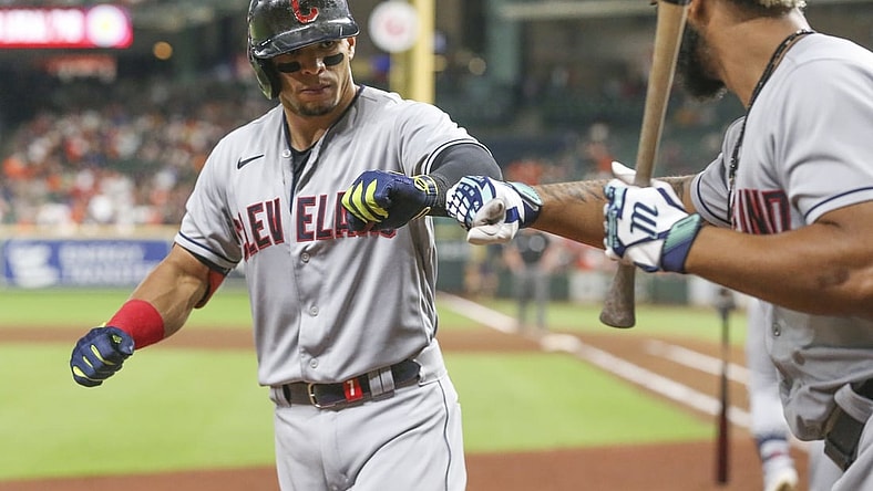 Jul 21, 2021; Houston, Texas, USA; Cleveland Indians designated hitter Bobby Bradley (44)  congratulates second baseman Cesar Hernandez (7) on his home run against the Houston Astros in the seventh inning at Minute Maid Park. Mandatory Credit: Thomas Shea-USA TODAY Sports