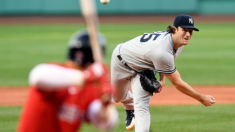 Jul 23, 2021; Boston, Massachusetts, USA; New York Yankees starting pitcher Gerrit Cole (45) pitches against the Boston Red Sox during the first inning at Fenway Park. Mandatory Credit: Brian Fluharty-USA TODAY Sports