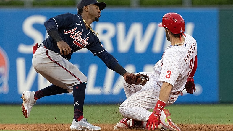 Jul 23, 2021; Philadelphia, Pennsylvania, USA; Philadelphia Phillies right fielder Bryce Harper (3) reaches second against Atlanta Braves second baseman Ozzie Albies (1) for a double during the third inning at Citizens Bank Park. Mandatory Credit: Bill Streicher-USA TODAY Sports