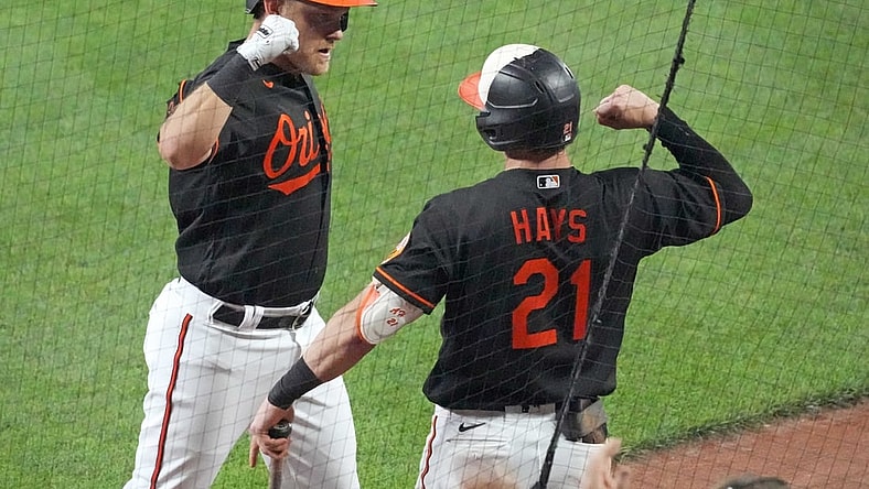 Jul 23, 2021; Baltimore, Maryland, USA; Baltimore Orioles second baseman Pat Valaika (11) is greeted by outfielder Austin Hays (21) following his fifth inning solo home run against the Washington Nationals at Oriole Park at Camden Yards. Mandatory Credit: Mitch Stringer-USA TODAY Sports