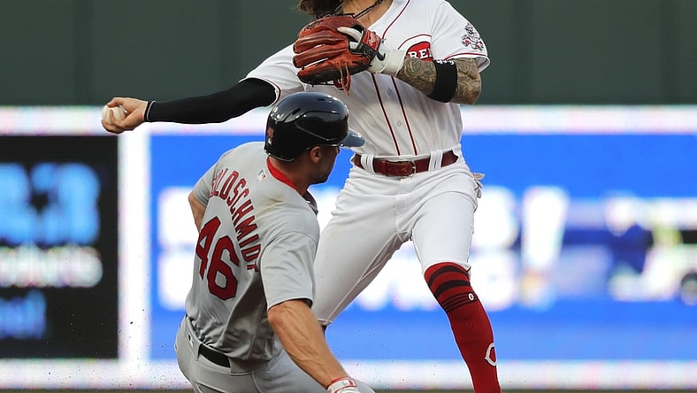 Jul 23, 2021; Cincinnati, Ohio, USA; St. Louis Cardinals first baseman Paul Goldschmidt (46) is forced out at second as Cincinnati Reds second baseman Jonathan India (6) throws to first to complete a double play in the third inning at Great American Ball Park. Mandatory Credit: David Kohl-USA TODAY Sports