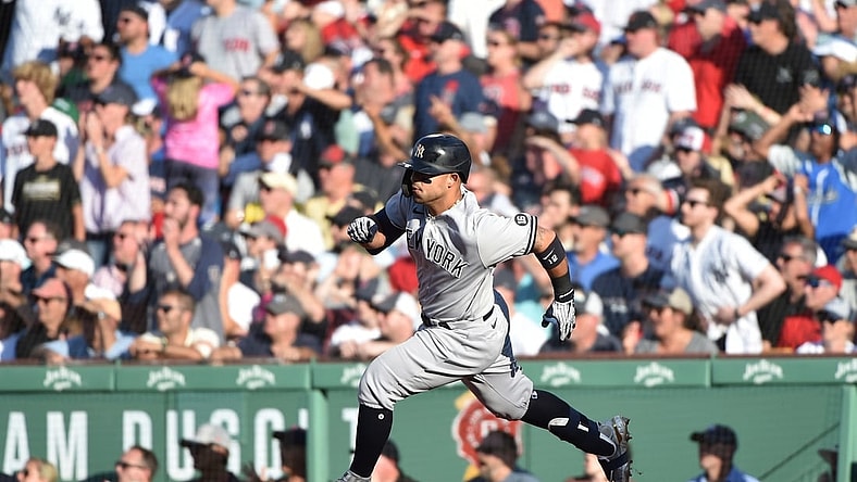 Jul 24, 2021; Boston, Massachusetts, USA; New York Yankees second baseman Rougned Odor (12) runs to second after hitting an RBI double during the eighth inning against the Boston Red Sox at Fenway Park. Mandatory Credit: Bob DeChiara-USA TODAY Sports