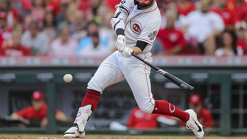 Jul 24, 2021; Cincinnati, Ohio, USA; Cincinnati Reds left fielder Jesse Winker (33) hits a RBI double against the St. Louis Cardinals in the second inning at Great American Ball Park. Mandatory Credit: Katie Stratman-USA TODAY Sports
